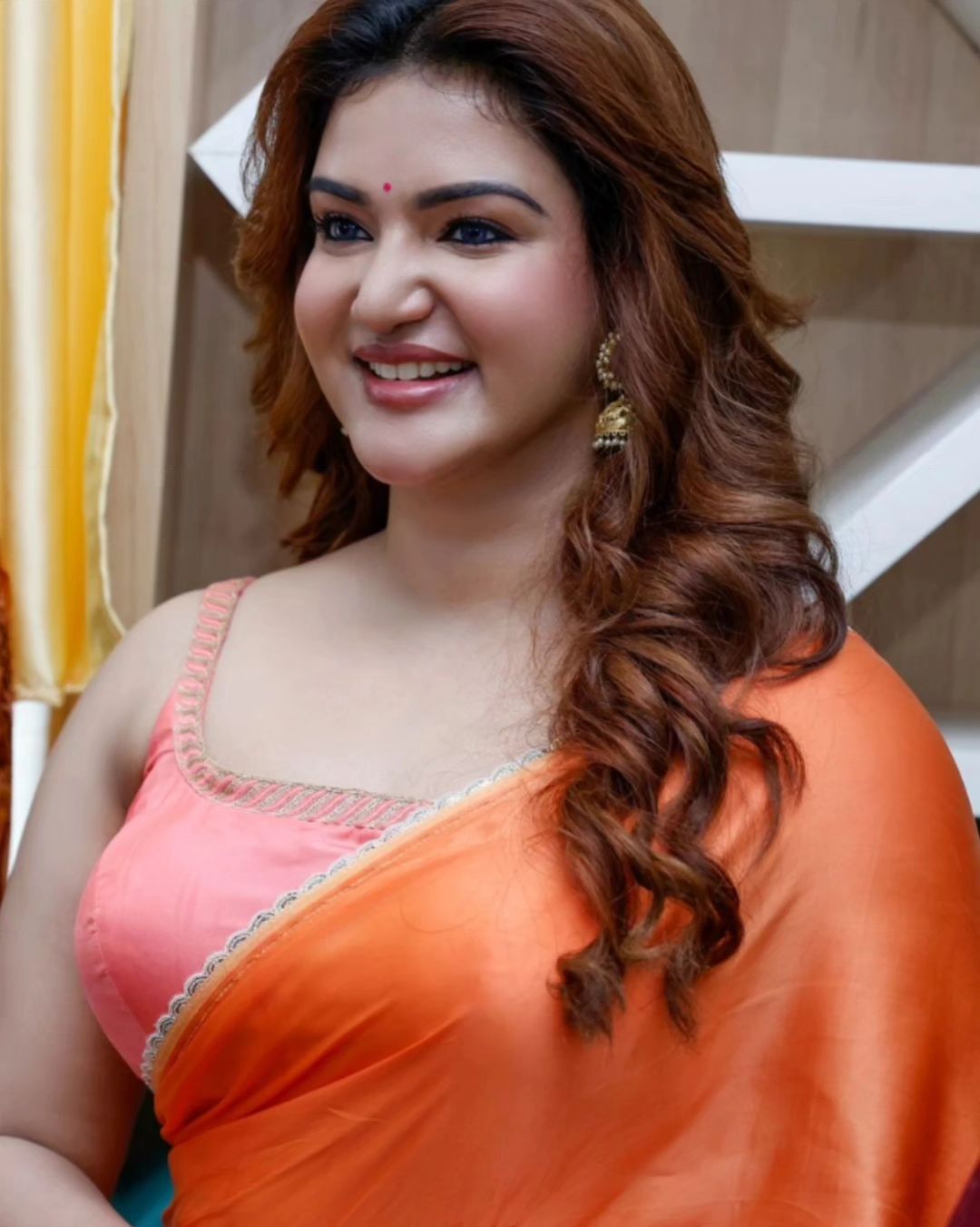 Malayalam Actress Honey Rose in Sleeveless Orange Saree